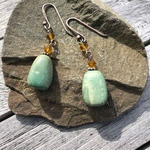 Green stone drop earrings.